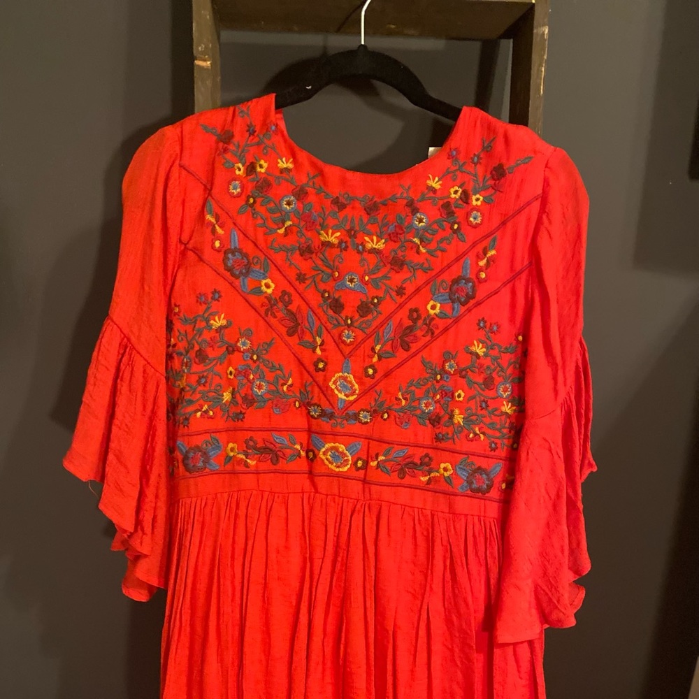 Baby doll style knee length dress.